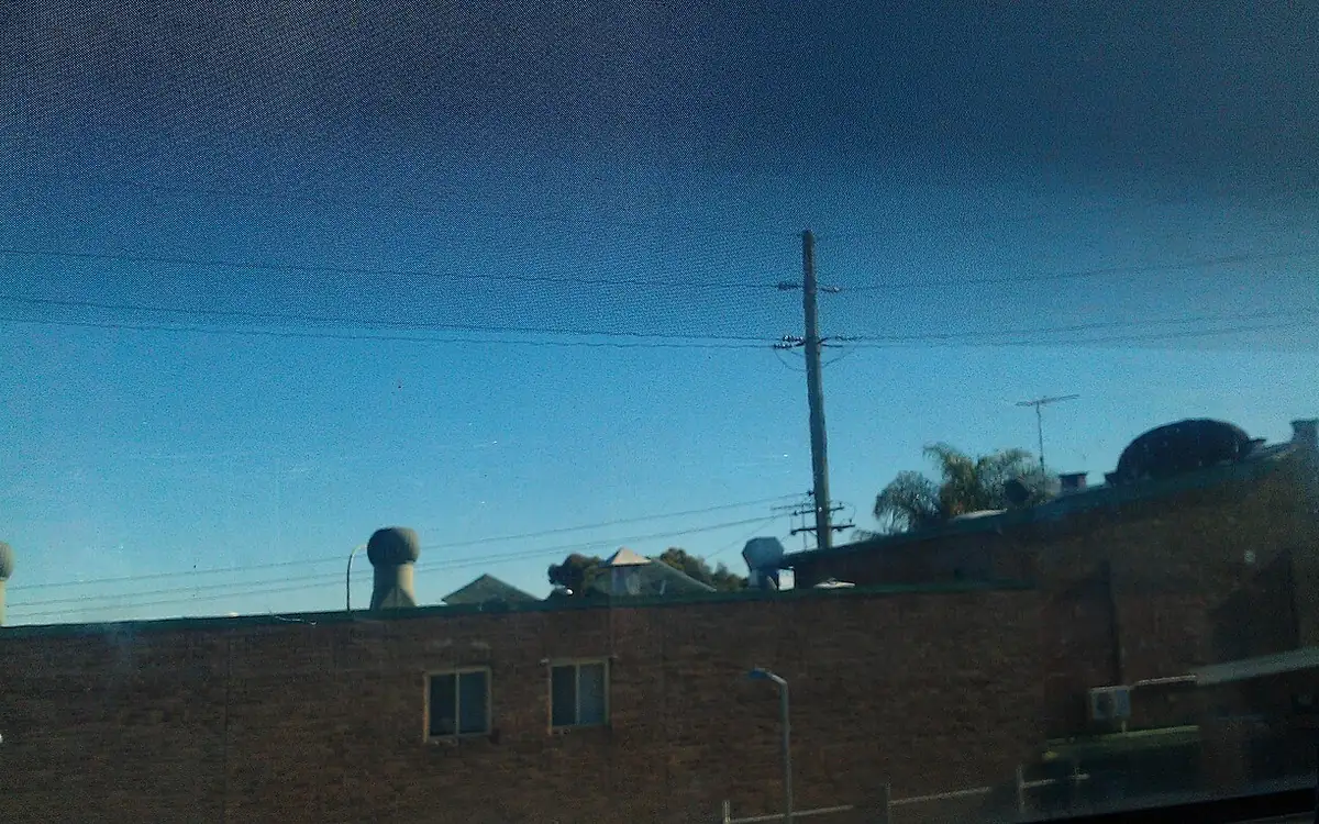Car with tinted windows on an Indian street