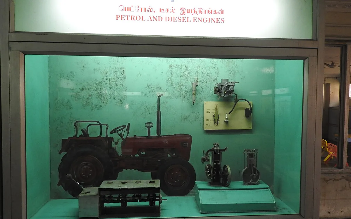 Petrol and diesel engine components comparison in a workshop