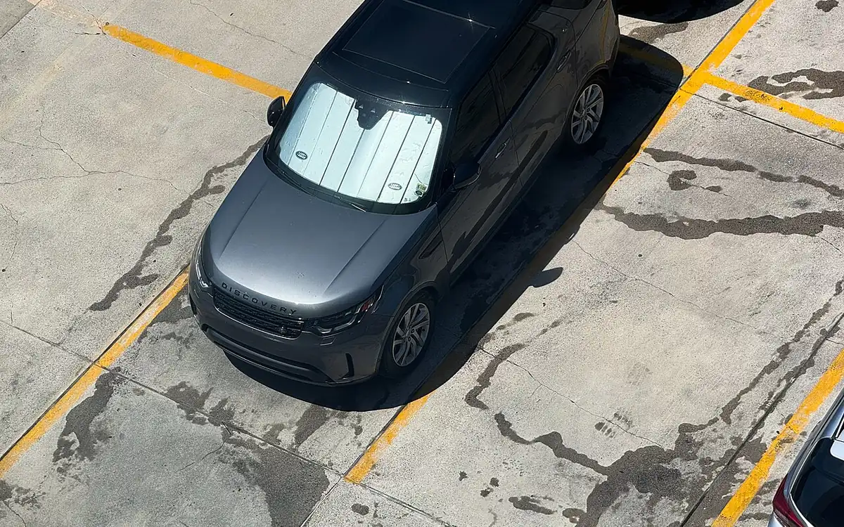 Windshield protection film deflecting small stones on highway