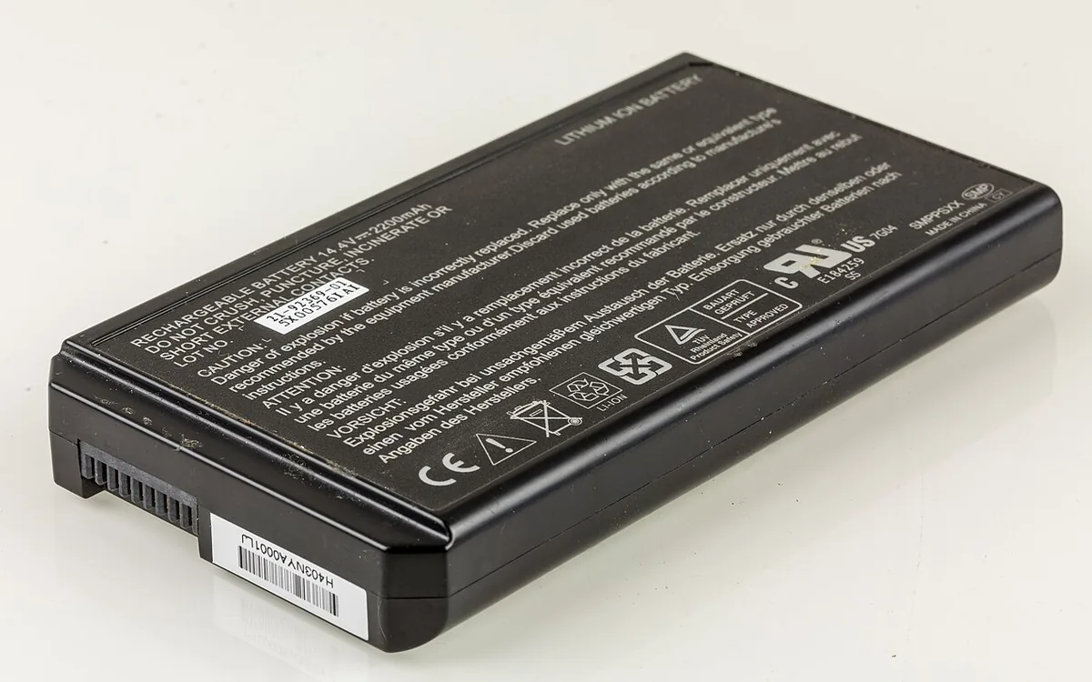 Different types of car batteries displayed in an auto parts shop