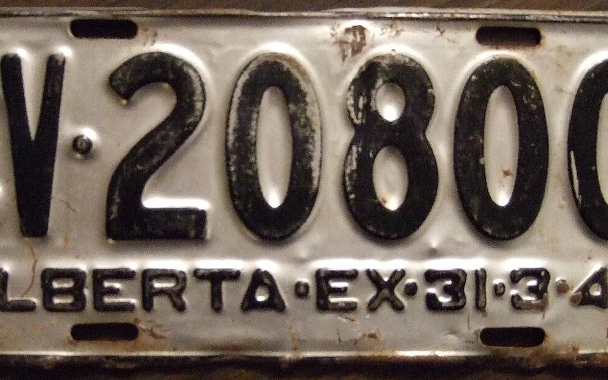 Collection of different coloured Indian vehicle number plates